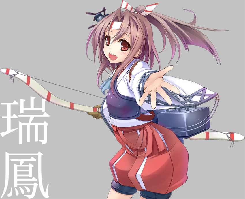 1girl airplane arrow blush bow_(weapon) brown_eyes brown_hair character_name flat_chest hachimaki hair_ribbon headband high_ponytail japanese_clothes kantai_collection light_brown_hair long long_hair muneate open_mouth personification ponytail ribbon shorts smile text wapokichi weapon zuihou_(kantai_collection)