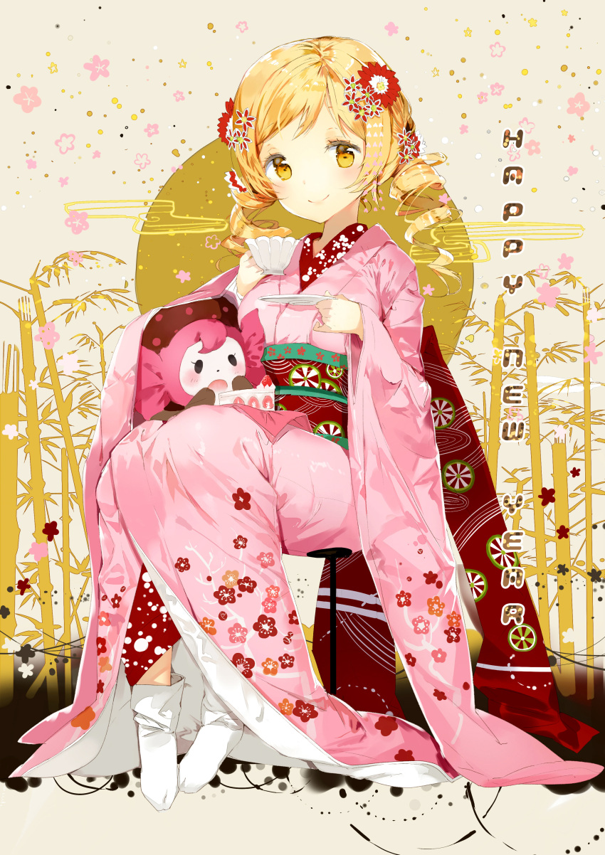 1girl absurdres anmi blonde_hair cake charlotte_(madoka_magica) cup drill_hair food hair_ornament highres japanese_clothes kimono long_sleeves looking_at_viewer mahou_shoujo_madoka_magica new_year obi plate sitting smile solo teacup tomoe_mami twin_drills white_legwear wide_sleeves yellow_eyes