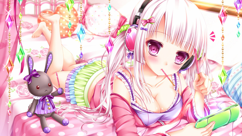 1girl barefoot bed blush breasts cleavage headphones highres long_hair lying mouth_hold on_stomach original pillow pink_hair pocky shitou skirt solo stuffed_animal stuffed_bunny stuffed_toy twintails violet_eyes