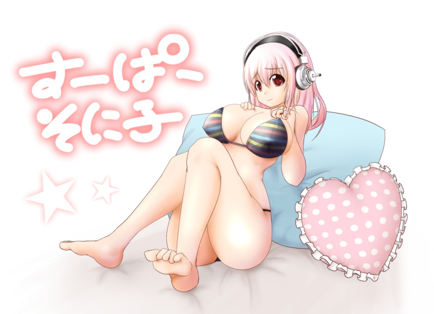 barefoot bikini breast_hold breasts character_name curvy feet headphones heart large_breasts long_hair nervous nitroplus pillow pink_hair red_eyes smile star super_sonico swimsuit tonky