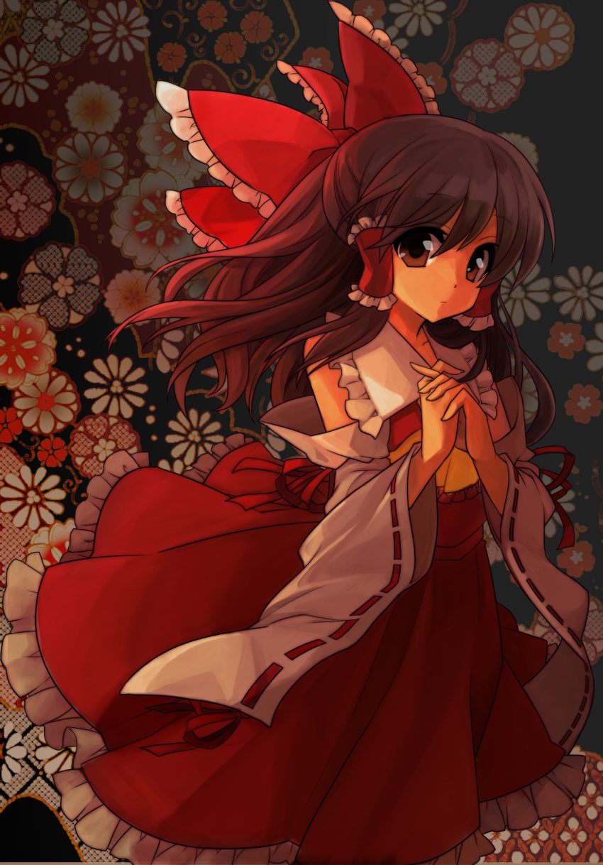 1girl absurdres bad_id black_hair brown_eyes colored detached_sleeves floral_background hair_ribbon hakurei_reimu hands hands_clasped highres japanese_clothes masaru.jp miko mitsuki32k ribbon solo touhou