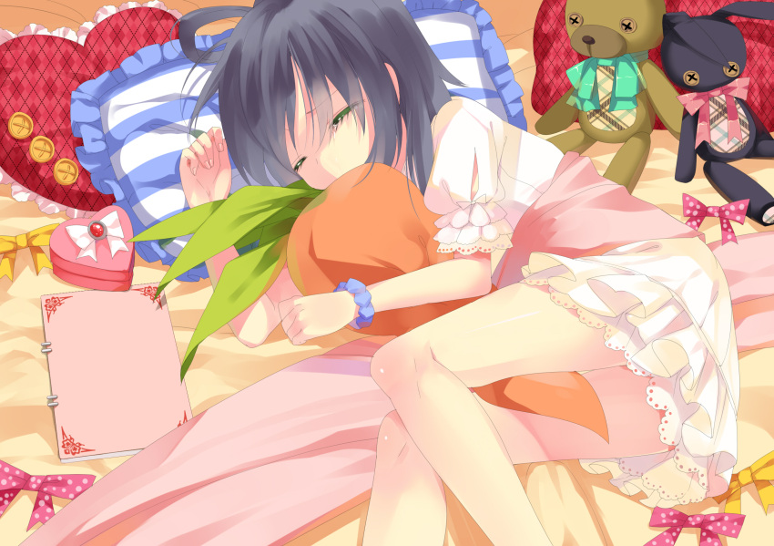 1girl closed_eyes heart highres luo_tianyi lying mvv pillow solo stuffed_animal stuffed_toy tears vocaloid