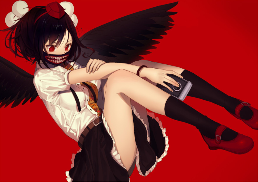 1girl belt bird_wings black_wings bracelet camera fangs hat hat_ribbon jewelry looking_at_viewer misoni_comi puffy_short_sleeves puffy_sleeves red_background red_eyes red_shoes ribbon shameimaru_aya shirt shoes short_sleeves skirt slit_pupils solo tokin_hat touhou what wings