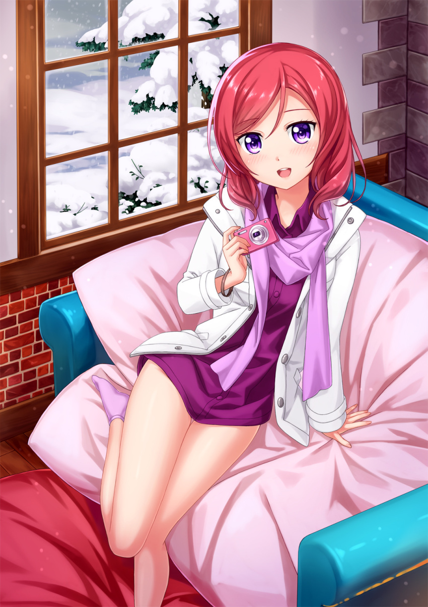 1girl blue_eyes camera coat couch highres holding jacket legs long_hair long_sleeves looking_at_viewer love_live!_school_idol_project nishikino_maki open_mouth redhead scarf shirt sitting smile socks solo thighs tucana window