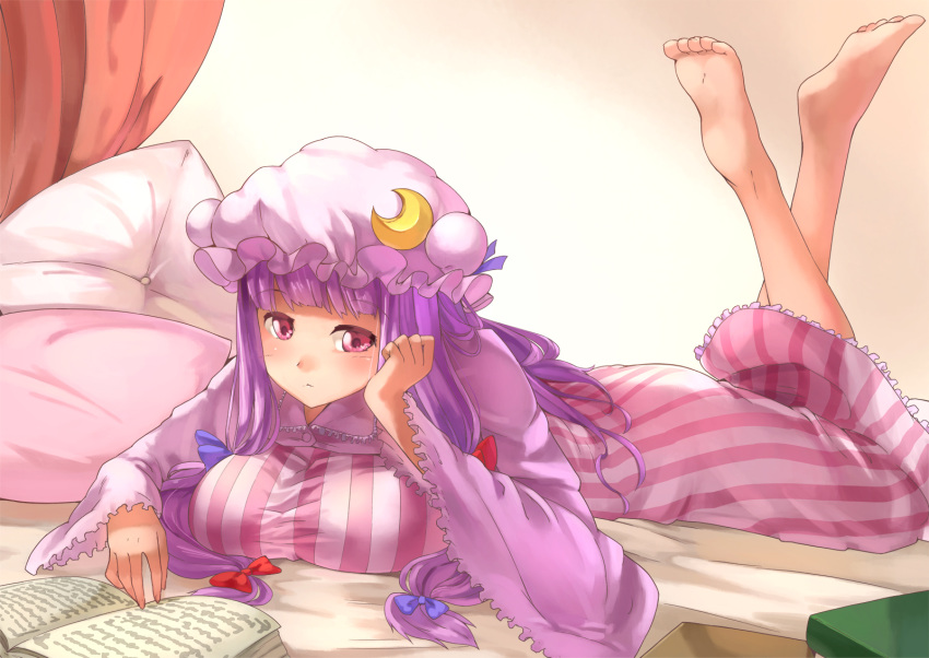 barefoot bed blanket blush book breast_squeeze breasts crescent_moon curtains feet_up hair_ornament hair_ribbon hand_on_own_cheek hat highres kanzen_bouon large_breasts long_hair lying moon nightgown on_stomach patchouli_knowledge pillow pink_eyes purple_hair reading ribbon striped touhou