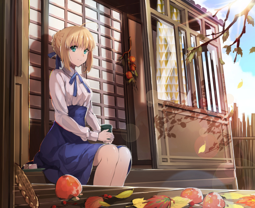 1girl ahoge autumn_leaves blonde_hair blush cup fate/stay_night fate_(series) food fruit green_eyes hair_ribbon highres ice_(ice_aptx) japanese_house looking_at_viewer ribbon saber sitting skirt solo teacup