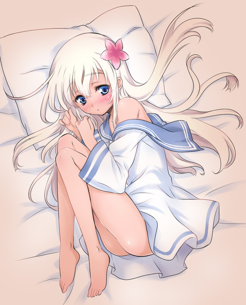 1girl bare_legs barefoot blonde_hair blue_eyes blush commentary_request fetal_position flower hair_flower hair_ornament highres kantai_collection kuzuryuu_kennosuke long_hair lying on_side open_mouth ro-500_(kantai_collection) sailor_dress solo tan