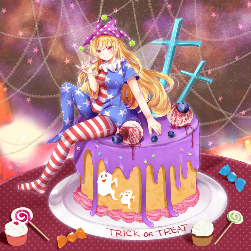 1girl alternate_legwear american_flag_legwear american_flag_shirt bangs blonde_hair blueberry blush cake cake_decoration candy clownpiece cross english eyeballs fairy_wings fake_blood food fruit grin hair_between_eyes halloween hat highres hips jester_cap lollipop long_hair masakazu_(coccinellee) plate short_sleeves sitting small_breasts smile solo star tablecloth thigh-highs thighs toes touhou trick_or_treat very_long_hair violet_eyes wings