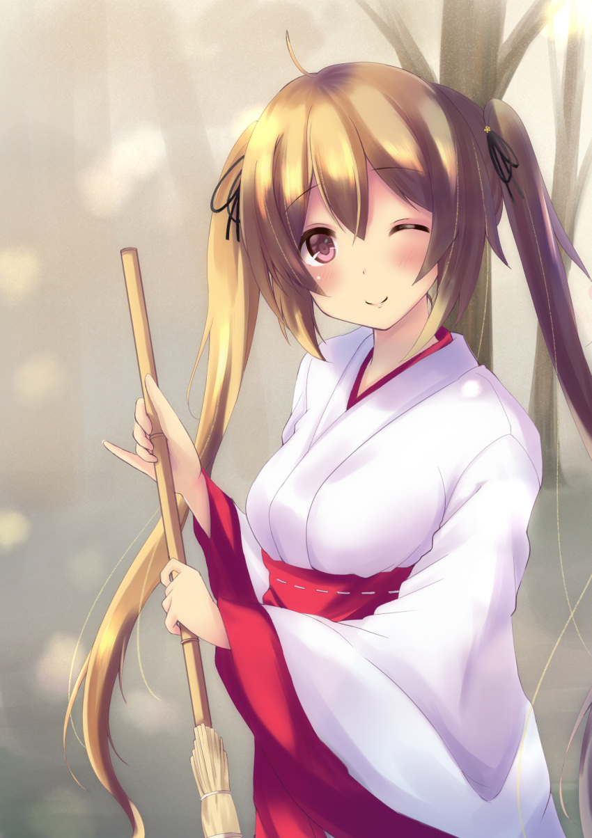1girl alternate_costume bamboo_broom blush broom brown_eyes hair_ornament hakama highres japanese_clothes kantai_collection light_brown_hair long_hair looking_at_viewer miko murasame_(kantai_collection) one_eye_closed purunyara red_skirt skirt smile solo twintails
