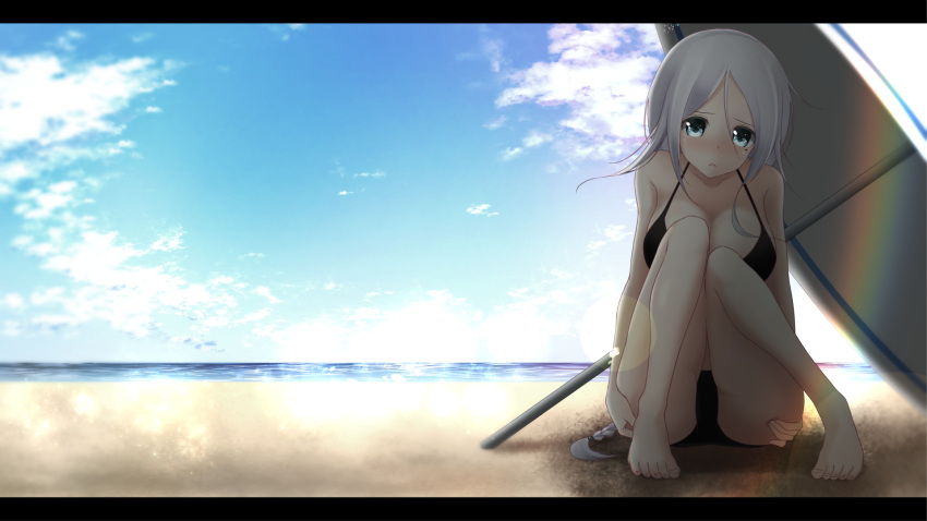 1girl bangs bare_legs bare_shoulders barefoot beach beach_umbrella bikini black_bikini blue_eyes blue_sky blush braid breasts clouds hair_tie hands_on_legs highres kantai_collection knees_together_feet_apart large_breasts letterboxed long_hair looking_at_viewer mole mole_under_eye nanahane_fl ocean outdoors parted_bangs rainbow sand silver_hair sky solo swimsuit twitter_username umbrella umikaze_(kantai_collection) very_long_hair water