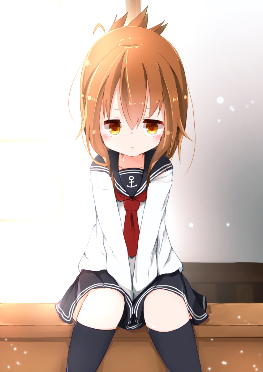 1girl :t anchor_symbol between_legs blush brown_eyes brown_hair commentary_request folded_ponytail gurantsu hand_between_legs highres inazuma_(kantai_collection) kantai_collection kneehighs long_hair looking_at_viewer neckerchief pout school_uniform serafuku sitting skirt solo