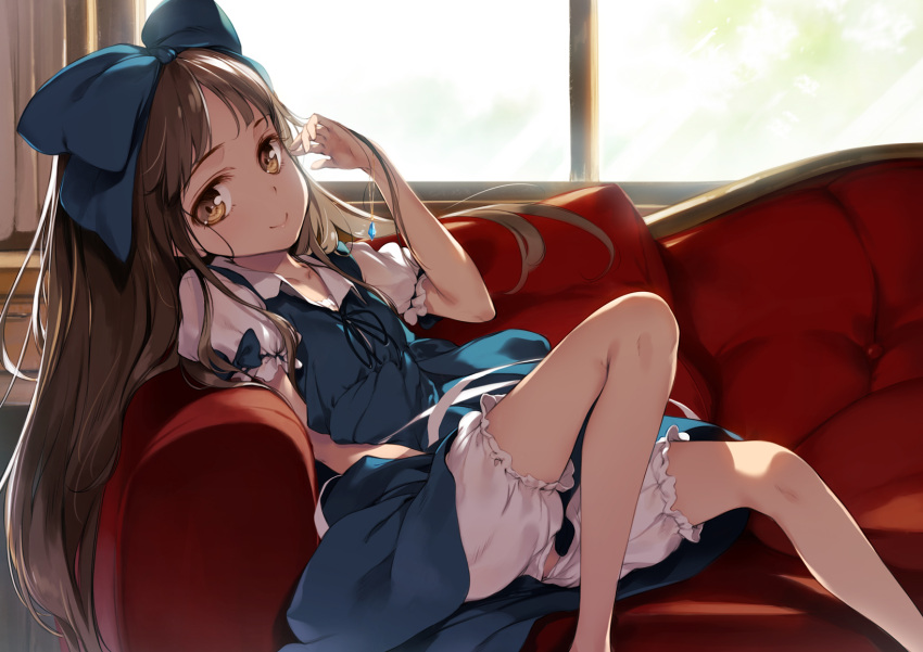 1girl black_ribbon bloomers blue_bow blue_dress bow brown_hair couch dress hair_bow highres indoors jewelry ke-ta long_hair looking_at_viewer pendant pillow puffy_short_sleeves puffy_sleeves ribbon short_sleeves sitting smile solo star_sapphire touhou underwear very_long_hair window yellow_eyes