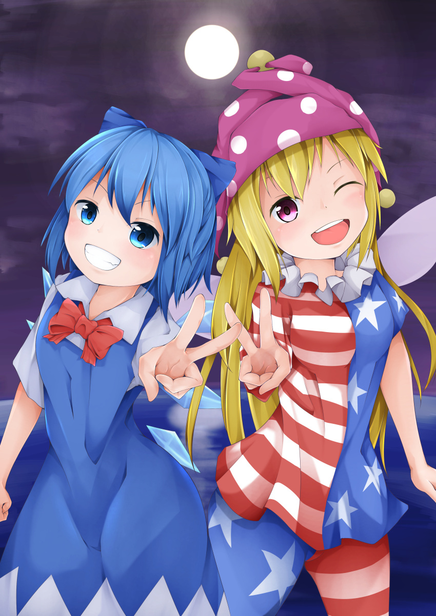 2girls ;d absurdres american_flag_legwear american_flag_shirt blonde_hair blue_dress blue_eyes blue_hair bow bowtie cirno clenched_hand clownpiece dress fairy_wings full_moon grin hair_ribbon hat highres jester_cap long_hair looking_at_viewer moon multiple_girls night one_eye_closed open_mouth outdoors outstretched_arm ribbon short_hair short_sleeves shou_(ahiru_shinobu) side-by-side smile touhou v very_long_hair water wings