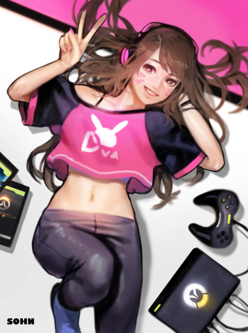 1girl absurdres artist_name black_bra bra bra_strap brown_eyes brown_hair casual clothes_writing controller cowboy_shot crop_top d.va_(overwatch) facial_mark game_console game_controller grin hand_in_hair headphones highres leg_up long_hair looking_at_viewer lying messy_hair midriff nail_polish navel off_shoulder on_back overwatch pants pink_nails pink_shirt shirt short_sleeves signature simple_background smile sohn_woohyoung solo t-shirt underwear v whisker_markings white_background