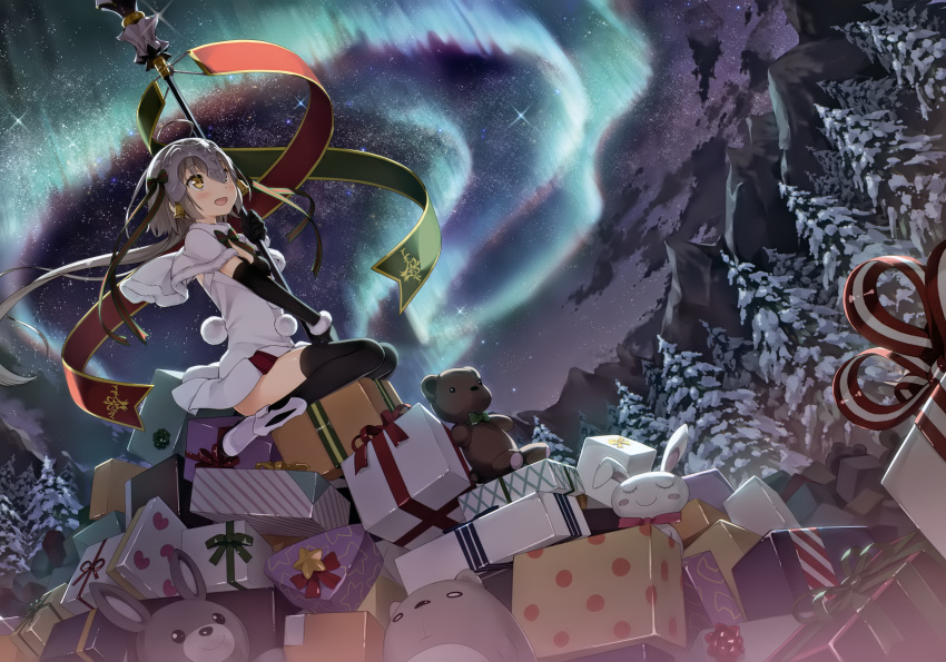 1girl absurdres ahoge aurora bangs bell bikini_top black_gloves black_legwear blush boots bow bowtie brown_hair cape clouds dress elbow_gloves fate/grand_order fate_(series) gift gloves green_bow green_ribbon headdress highres holding huge_filesize jeanne_alter jeanne_alter_(santa_lily)_(fate) kantoku long_hair looking_away mountain open_mouth red_ribbon ribbon ruler_(fate/apocrypha) scan sky snow solo star stuffed_animal stuffed_toy teddy_bear thigh-highs tree white_cape white_dress yellow_eyes