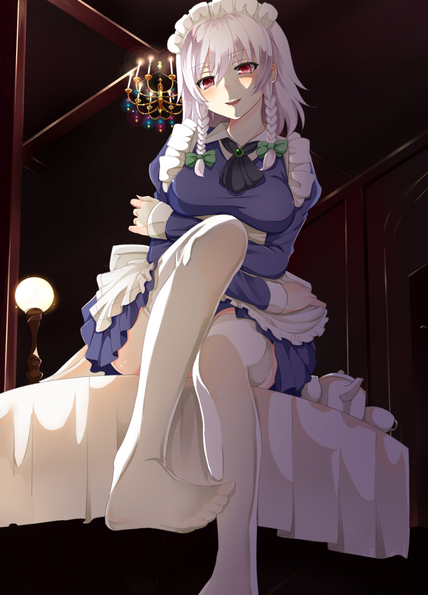 1girl :d apron ascot blue_dress blush bow braid breasts brooch chandelier crossed_arms cup dress feet green_bow hair_bow highres izayoi_sakuya jewelry juliet_sleeves legs long_sleeves looking_at_viewer maid_headdress nuko_(mikupantu) open_mouth puffy_sleeves red_eyes shaded_face short_hair silver_hair sitting sitting_on_table smile solo tea_set teacup teapot thigh-highs touhou twin_braids waist_apron white_legwear