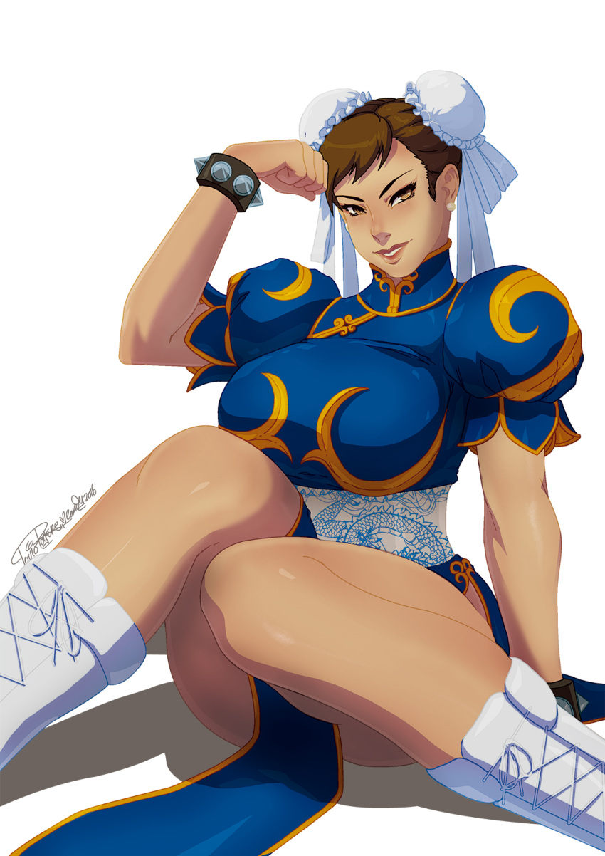 1girl bracelet capcom chinese_clothes chun-li double_bun hair_bun highres jewelry looking_at_viewer no_legwear sitting solo spiked_bracelet spikes street_fighter tovio_rogers wariza