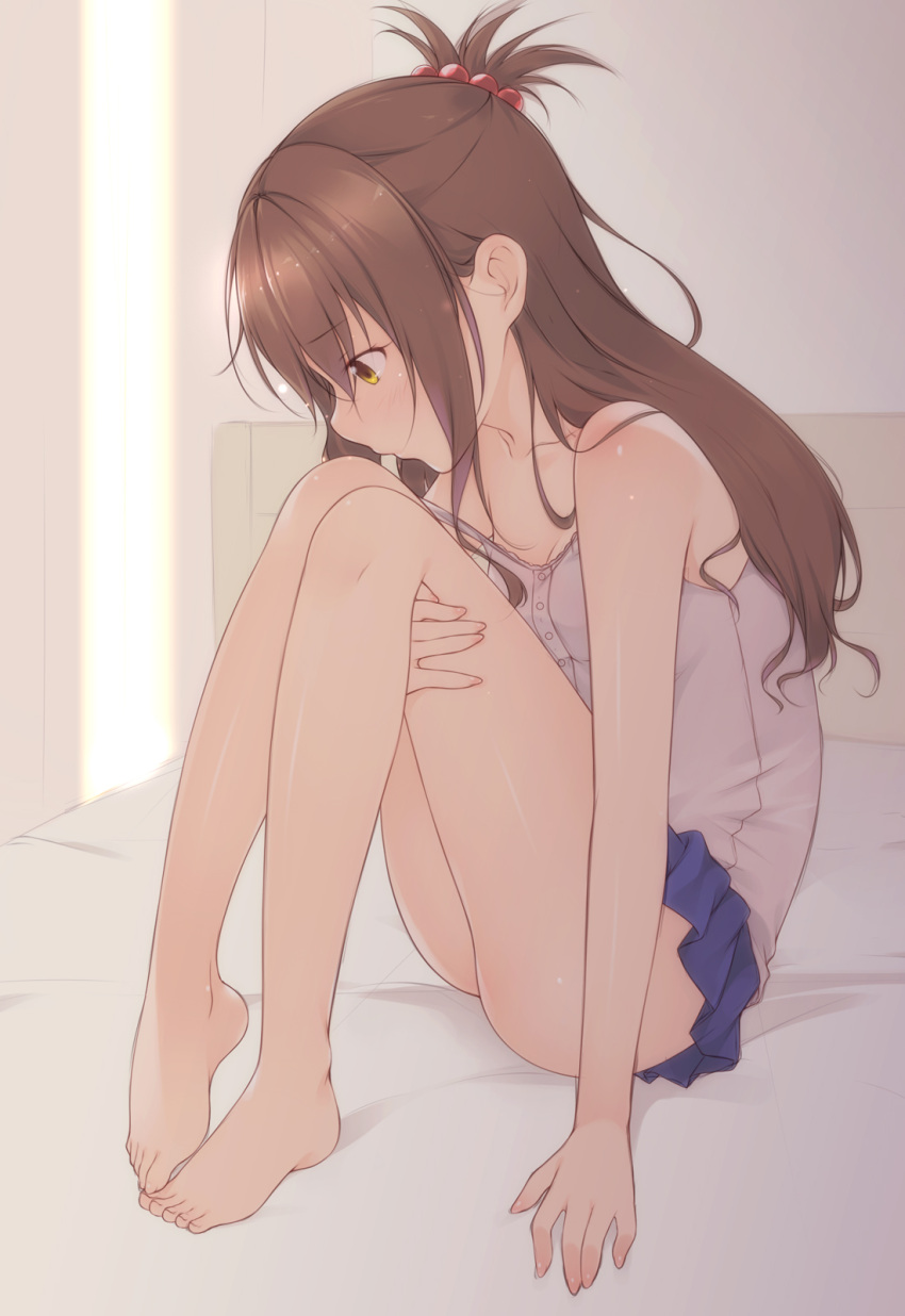 1girl bare_arms bare_legs bare_shoulders barefoot blue_skirt blush breasts brown_hair camisole cleavage collarbone eyebrows eyebrows_visible_through_hair feet from_side hair_bobbles hair_ornament highres knees_up long_hair looking_down miniskirt one_side_up profile shokuyou_mogura sitting skirt sleeveless solo strap_slip thighs to_love-ru yellow_eyes yuuki_mikan