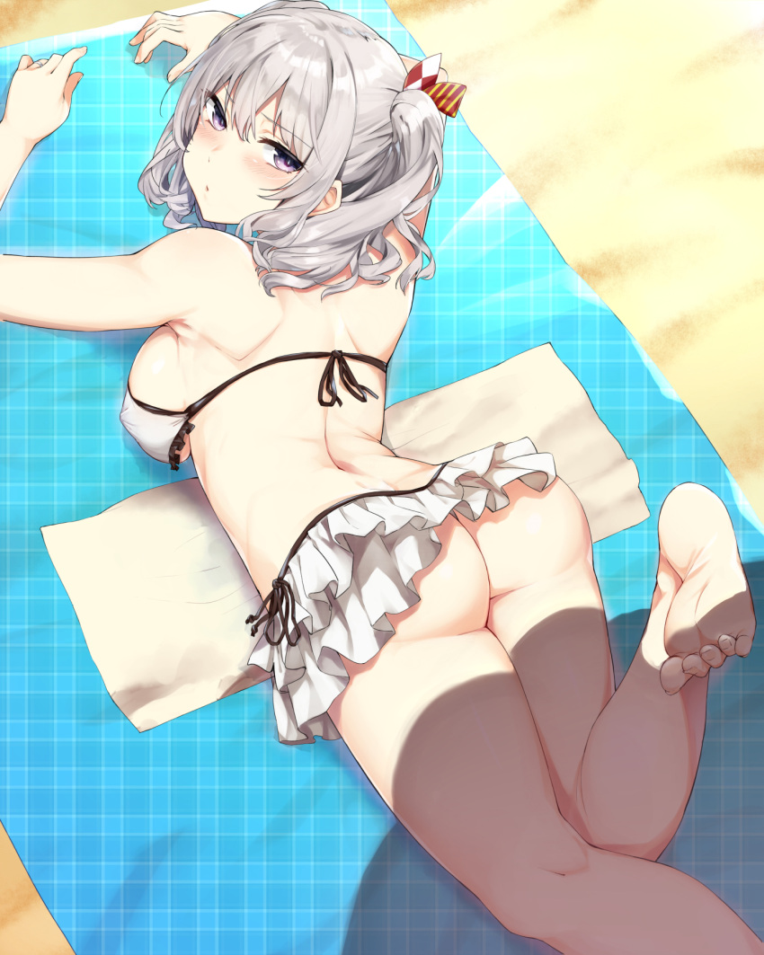 1girl alternate_costume ass bare_arms bare_legs barefoot beach bikini bikini_skirt blue_eyes blush bow breast_press breasts covered_nipples embarrassed floral_background from_above hair_between_eyes hair_bow highres hiromochi_(hiro39ra1) kantai_collection kashima_(kantai_collection) large_breasts looking_at_viewer looking_back lying midriff on_stomach pout shadow sideboob silver_hair soles solo swimsuit thighs toes twintails white_bikini