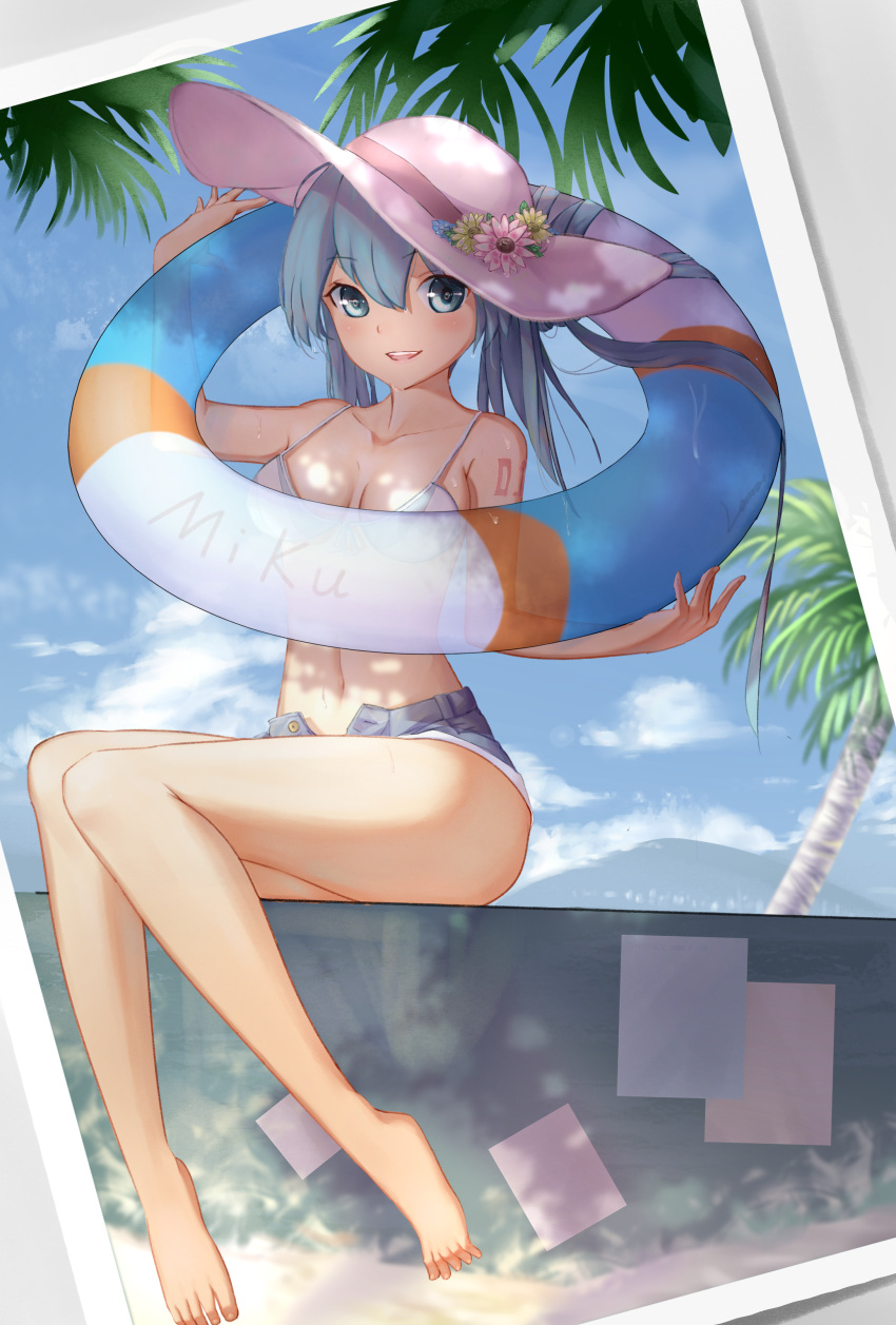 1girl absurdres barefoot bikini_top blue_eyes blue_hair breasts flower hat hatsune_miku highres lanzi_(415460661) looking_at_viewer medium_breasts navel photo_(object) shorts sitting smile solo twintails unbuttoned vocaloid