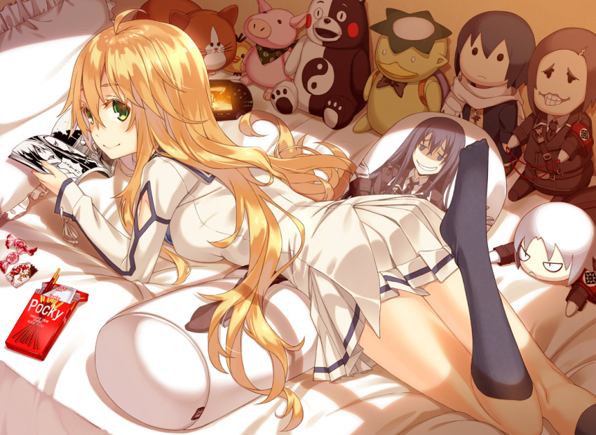 1girl ass back bed black_legwear blonde_hair book breasts candy dakimakura_(object) dies_irae green_eyes handheld_game_console kappa kimura_(ykimu) kneehighs looking_at_viewer looking_back lying on_stomach open_book pillow playstation_portable pocky smile solo stuffed_animal stuffed_toy teddy_bear