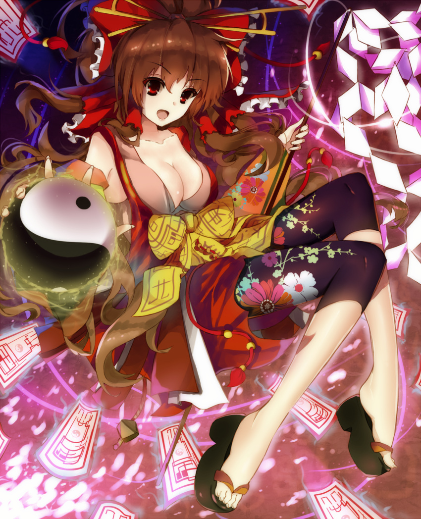 &gt;:d 1girl :d alternate_costume bare_shoulders bent_knees bike_shorts blizzomos bow breasts brown_hair cleavage collarbone commentary floral_print foreshortening full_body geta gohei hair_bow hair_ornament hair_stick hair_tubes hakurei_reimu highres japanese_clothes large_breasts long_hair looking_at_viewer ofuda open_mouth print_shorts red_bow red_eyes shorts shorts_under_skirt smile solo touhou yellow_bow yin_yang