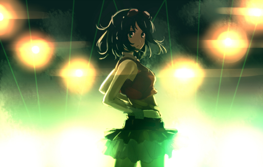 1girl backlighting bare_shoulders closed_mouth cowboy_shot from_behind goggles goggles_on_head green_eyes green_hair gumi hands_on_hips layered_skirt looking_at_viewer looking_back ryokucha_manma shirt short_hair sleeveless sleeveless_shirt solo stage_lights vocaloid wrist_cuffs