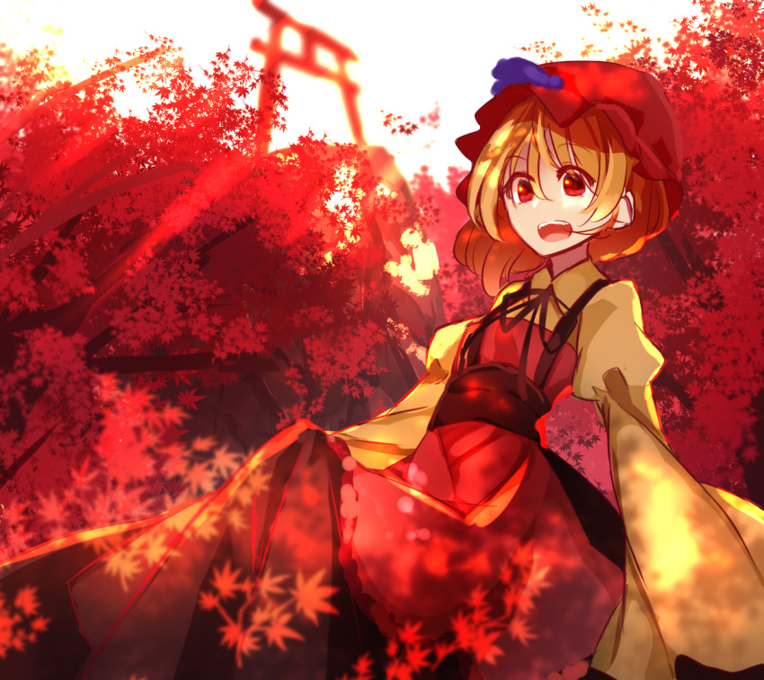 1girl aki_minoriko autumn_leaves backlighting black_ribbon blonde_hair cliff dress food fruit grapes hat juliet_sleeves leaf long_sleeves looking_at_viewer maple_leaf mob_cap neck_ribbon open_mouth peach_camellia puffy_sleeves red_eyes ribbon sash scenery short_hair solo torii touhou tree wide_sleeves