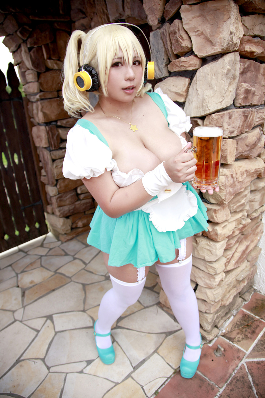 1girl asian blonde_hair breasts brown_eyes chouzuki_maryou cleavage cosplay dirndl garden german_clothes headphones jewelry large_breasts necklace nitroplus photo plump short_hair solo star super_pochaco super_pochaco_(cosplay) thigh-highs