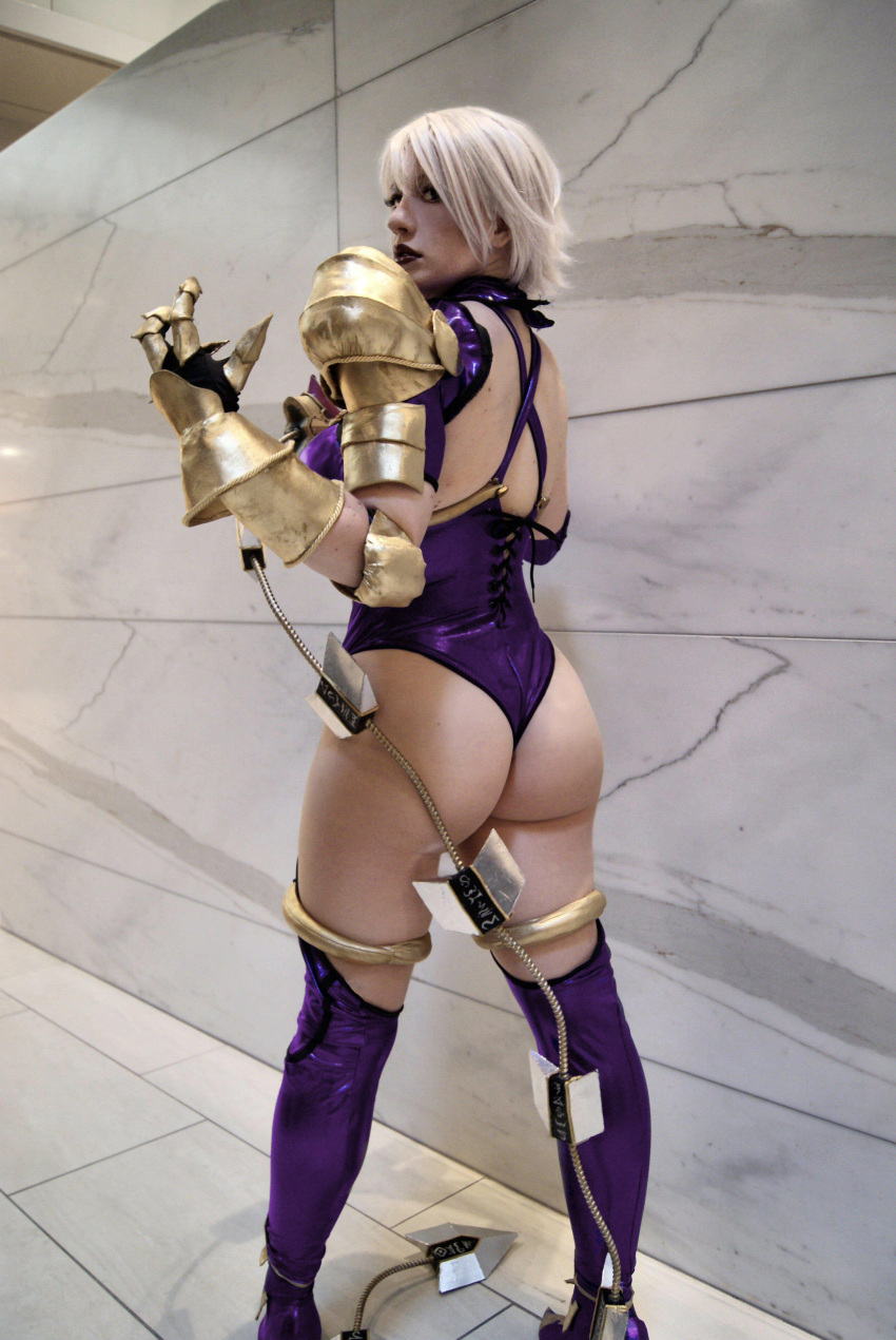 1girl ass bellechere cosplay highres huge_ass isabella_valentine isabella_valentine_(cosplay) namco photo solo soul_calibur soulcalibur_ii thick_thighs thigh-highs thighs white_hair