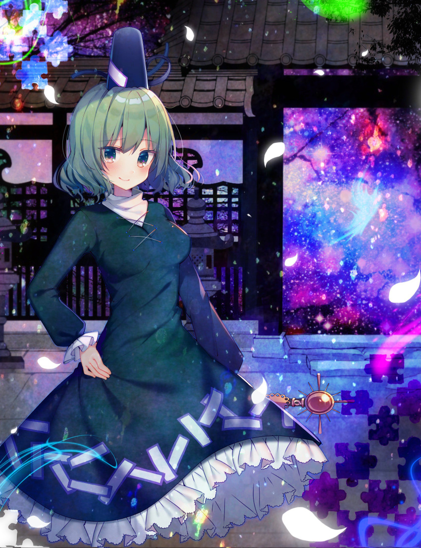 1girl absurdres architecture blush breasts closed_mouth dress east_asian_architecture ghost ghost_tail green_dress green_eyes green_hair hand_on_hip hat highres japanese_clothes koto_seori long_sleeves looking_at_viewer medium_breasts outdoors petals petticoat puffy_long_sleeves puffy_sleeves puzzle short_hair smile soga_no_tojiko solo tate_eboshi tears touhou