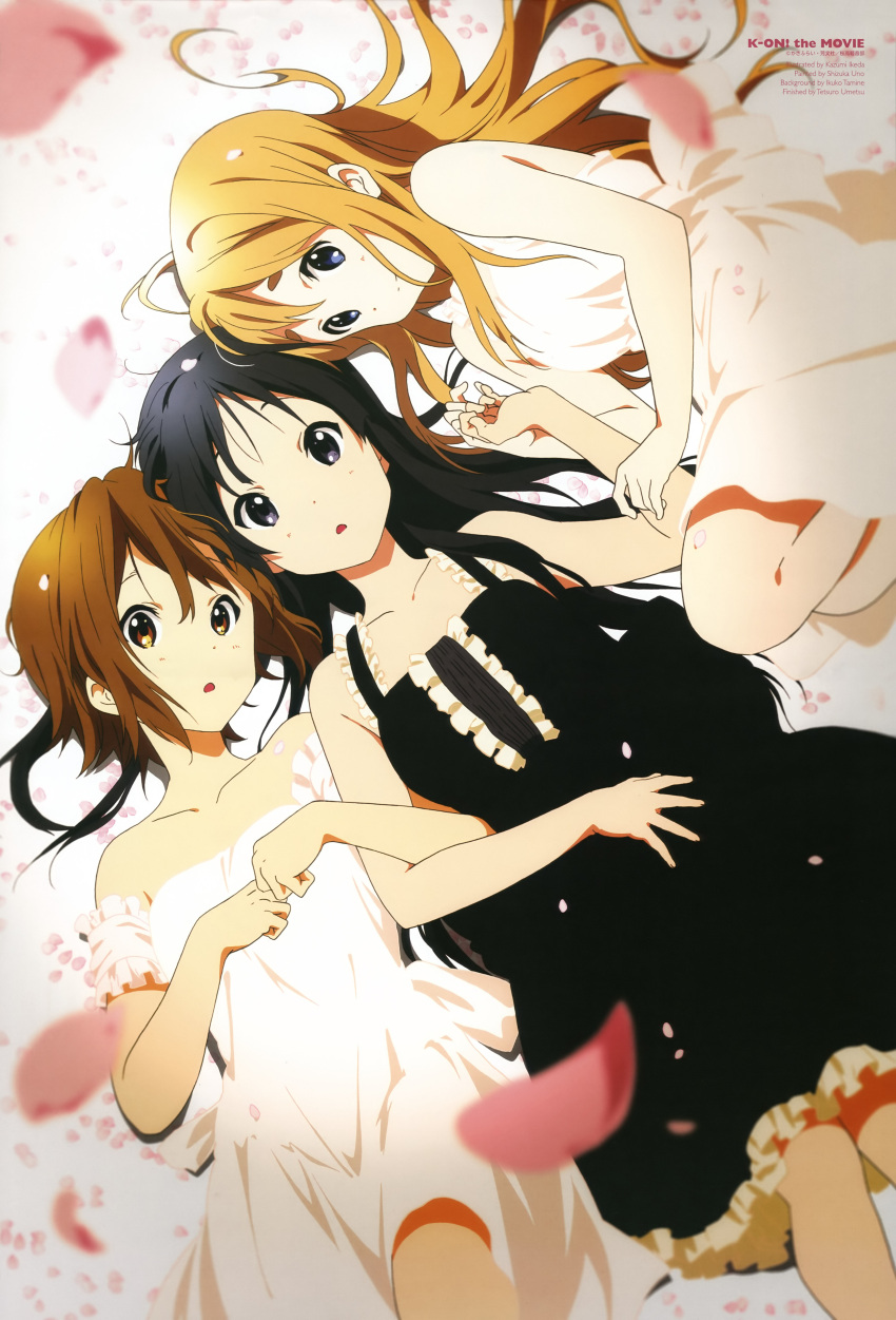 3girls :o absurdres akiyama_mio animage bare_shoulders black_eyes black_hair blonde_hair blue_eyes brown_eyes brown_hair dress eyebrows highres ikeda_kazumi k-on! k-on!_movie kotobuki_tsumugi locked_arms long_hair looking_at_viewer lying multiple_girls official_art petals scan short_hair tainaka_ritsu