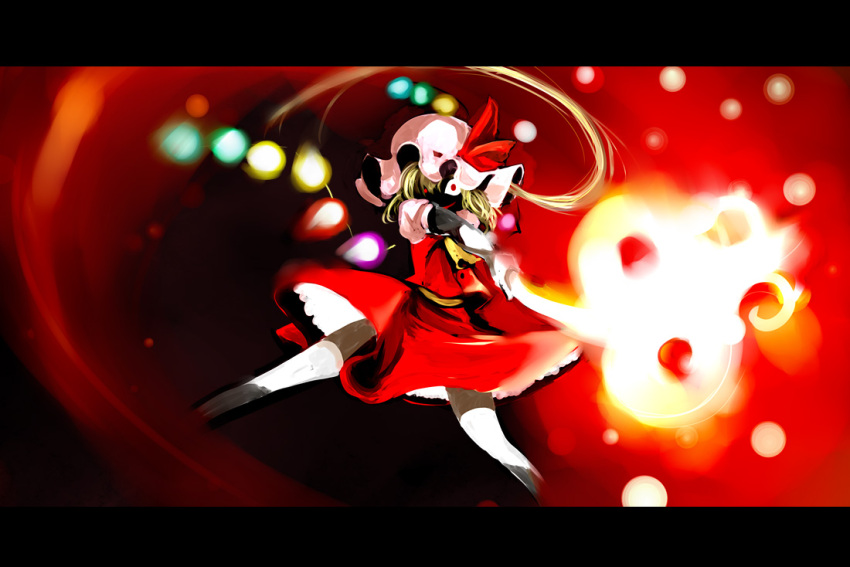 1girl bad_id blonde_hair crazy crazy_eyes crazy_smile female fire flandre_scarlet grin hat kintaro laevatein letterboxed ribbon short_hair smile solo touhou wings