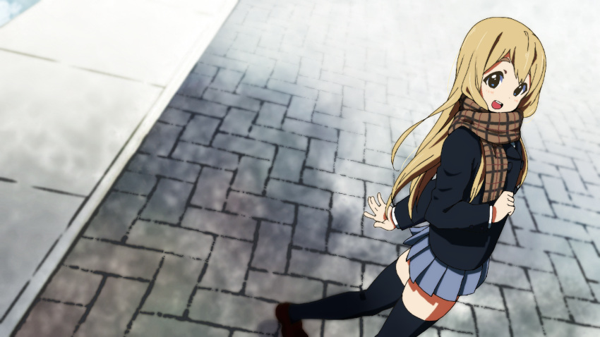 1girl black_legwear blonde_hair blue_eyes blue_skirt brown_scarf eyebrows highres homura_shinji k-on! kotobuki_tsumugi long_hair open_mouth plaid plaid_scarf pleated_skirt road scarf school_uniform skirt standing street thigh-highs