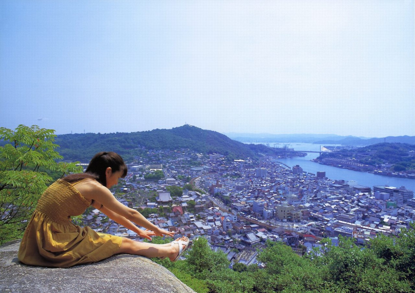 asian city cityscape day dress female landscape mountain photo reaching river tree water