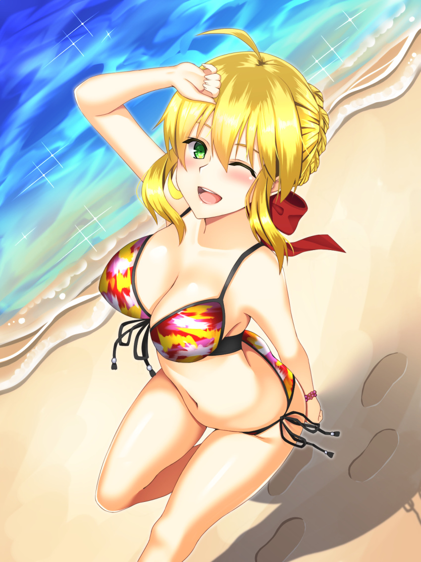 1girl ahoge beach bikini blonde_hair bracelet breasts cleavage fate/extra fate_(series) footprints fosamaguna from_above front-tie_bikini front-tie_top green_eyes highres jewelry looking_at_viewer multicolored_bikini navel one_eye_closed open_mouth outdoors ribbon saber_extra shiny shiny_hair side-tie_bikini solo swimsuit water