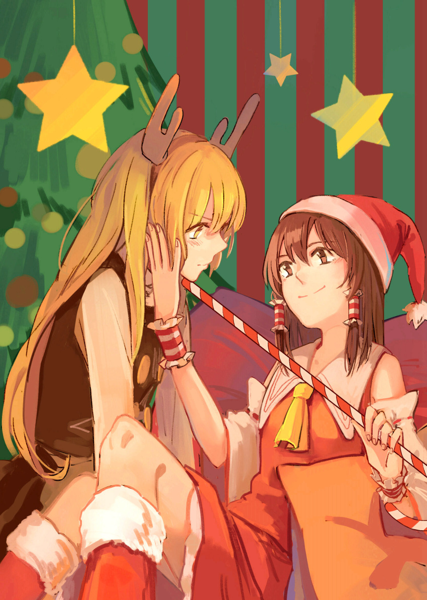2girls absurdres antlers apron ascot bigreen black_skirt black_vest blonde_hair blush boots brown_eyes brown_hair candy candy_cane christmas christmas_ornaments christmas_tree cushion detached_sleeves dress fake_antlers food fur-trimmed_boots green_background hair_tubes hakurei_reimu hat highres kirisame_marisa long_sleeves looking_at_another multiple_girls red_background red_boots red_dress red_hat reindeer_antlers ribbon-trimmed_sleeves ribbon_trim santa_hat skirt smile star striped striped_background touhou vest waist_apron white_apron wide_sleeves wrist_cuffs yellow_eyes yuri