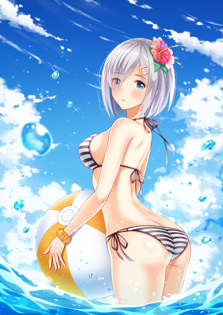 1girl absurdres ass ball beachball bikini blue_eyes blue_sky breasts butt_crack carrying clouds cloudy_sky commentary_request day eyebrows eyebrows_visible_through_hair flower hair_flower hair_ornament hair_over_one_eye hairclip hamakaze_(kantai_collection) hibiscus highres horizon kantai_collection looking_at_viewer ltt_challenger multi-strapped_bikini ocean outdoors partially_submerged revision scrunchie short_hair side-tie_bikini sideboob silver_hair sky solo striped striped_bikini swimsuit water water_drop wrist_scrunchie