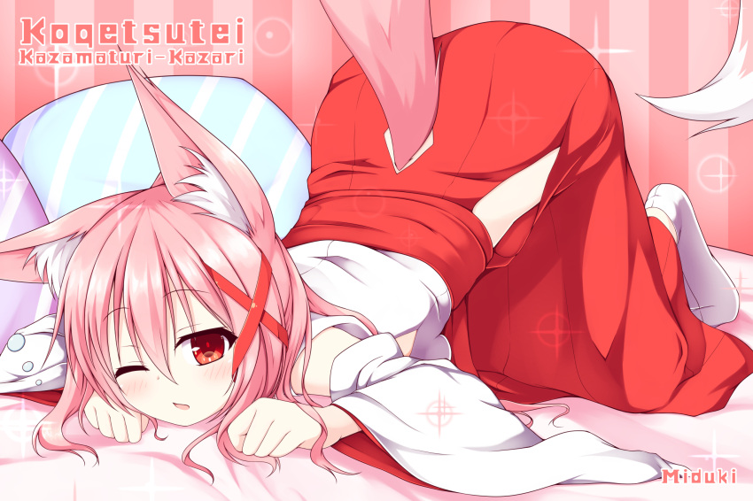 1girl animal_ears artist_name bangs bed_sheet blush character_name circle_name detached_sleeves eyebrows_visible_through_hair fox_ears fox_girl fox_tail hair_between_eyes hair_ornament hakama highres japanese_clothes kazamatsuri_kazari long_hair looking_at_viewer miko mizuki_(kogetsu-tei) nontraditional_miko on_bed one_eye_closed original parted_lips pillow pink_hair socks solo sparkle striped striped_background striped_pillow tail top-down_bottom-up vertical-striped_background vertical_stripes white_legwear wide_sleeves x_hair_ornament