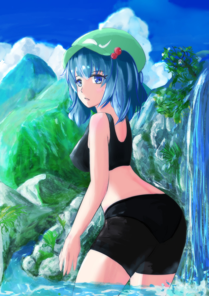 1girl ass bare_shoulders bike_shorts black_panties blue_eyes blue_hair blue_sky blush breasts cabbie_hat clouds cloudy_sky cowboy_shot crop_top day eyebrows_visible_through_hair flower from_behind grass green_hat hair_bobbles hair_ornament hat highres kawashiro_nitori looking_at_viewer looking_back matching_hair/eyes medium_breasts midriff moss mountain open_mouth panties panties_under_bike_shorts partially_submerged plant river rock saitamawan short_hair sky solo stone thighs touhou two_side_up underwear wading water waterfall