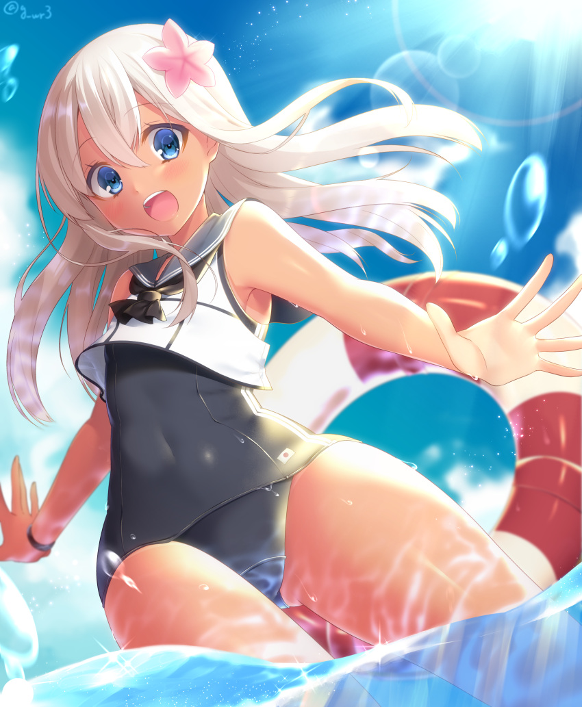 1girl blonde_hair day flower hair_flower hair_ornament highres jiiwara kantai_collection lifebuoy long_hair ocean one-piece_swimsuit one-piece_tan open_mouth ro-500_(kantai_collection) sky smile solo splashing swimsuit swimsuit_under_clothes tan tanline wading water
