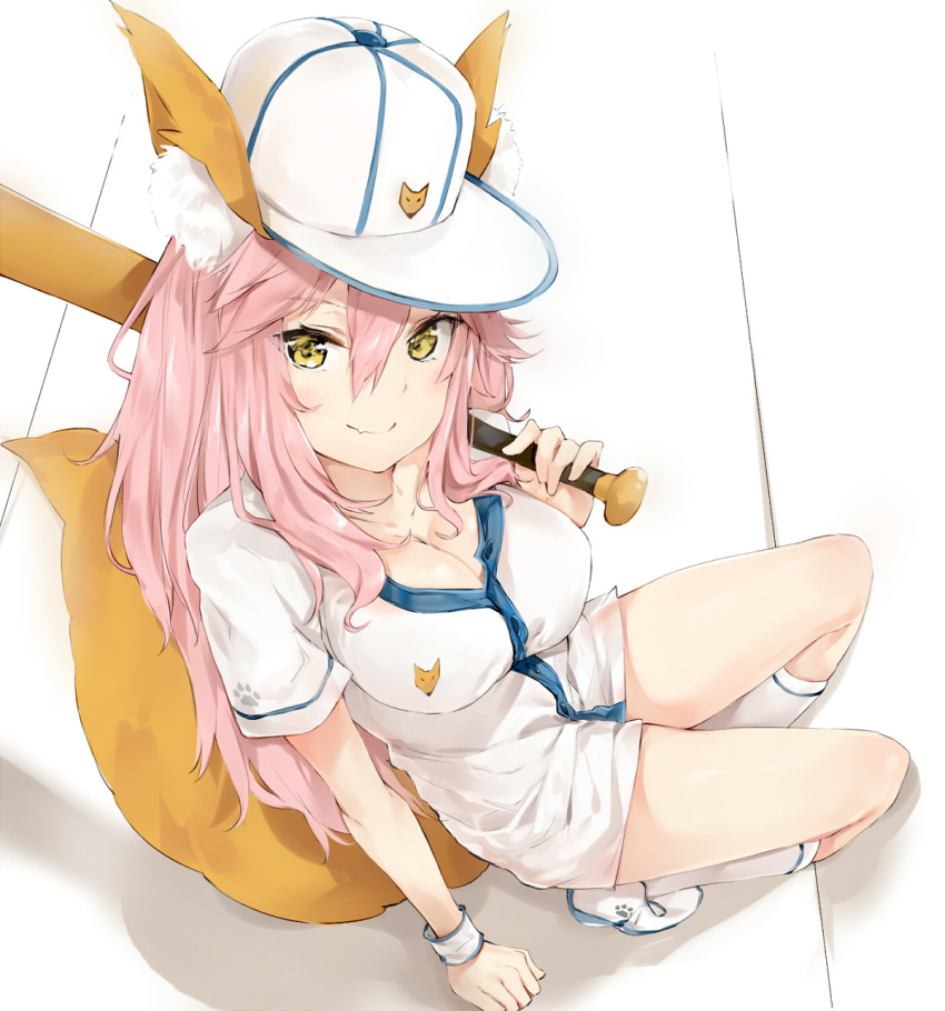 1girl alternate_costume animal_ears baseball_bat baseball_cap baseball_uniform breasts cleavage fang_out fate/extra fate_(series) fox_ears fox_tail from_above hat highres kneehighs large_breasts long_hair looking_at_viewer pink_hair shoes silver_(chenwen) sitting smile solo sportswear tail tamamo_(fate)_(all) tamamo_no_mae_(fate) white_legwear white_shoes wrist_cuffs yellow_eyes