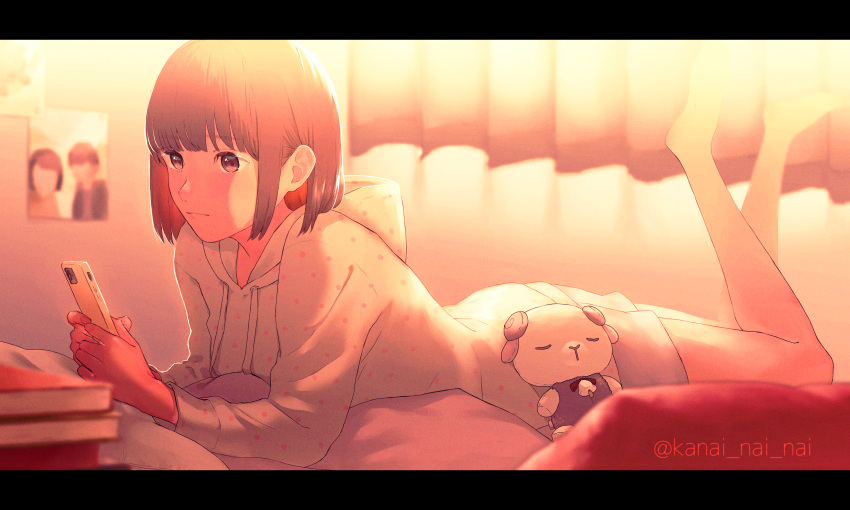 1girl absurdres barefoot book book_stack brown_eyes brown_hair cellphone commentary_request curtains dusk expressionless feet from_side highres holding holding_phone hood hoodie indoors kanai_(nai_nai) letterboxed long_sleeves lying on_bed on_stomach original phone photo_(object) short_hair shorts smartphone solo stuffed_toy twilight
