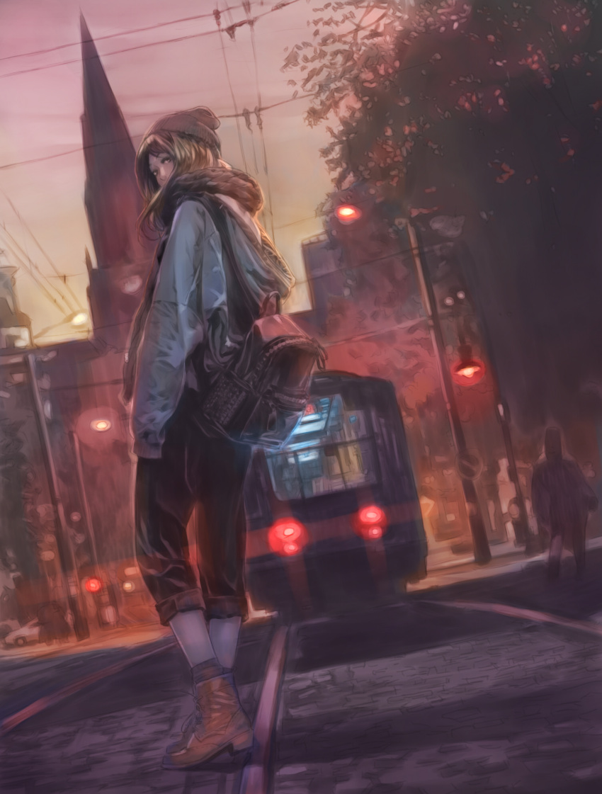 1girl backpack bag beanie black_jeans blonde_hair cityscape clouds cloudy_sky denim dutch_angle ground_vehicle hat highres hood hooded_jacket jacket jeans jian_huang lamppost light_trail looking_at_viewer looking_down original pants pants_rolled_up power_lines road scare scarf sky solo street sunset train tree twilight