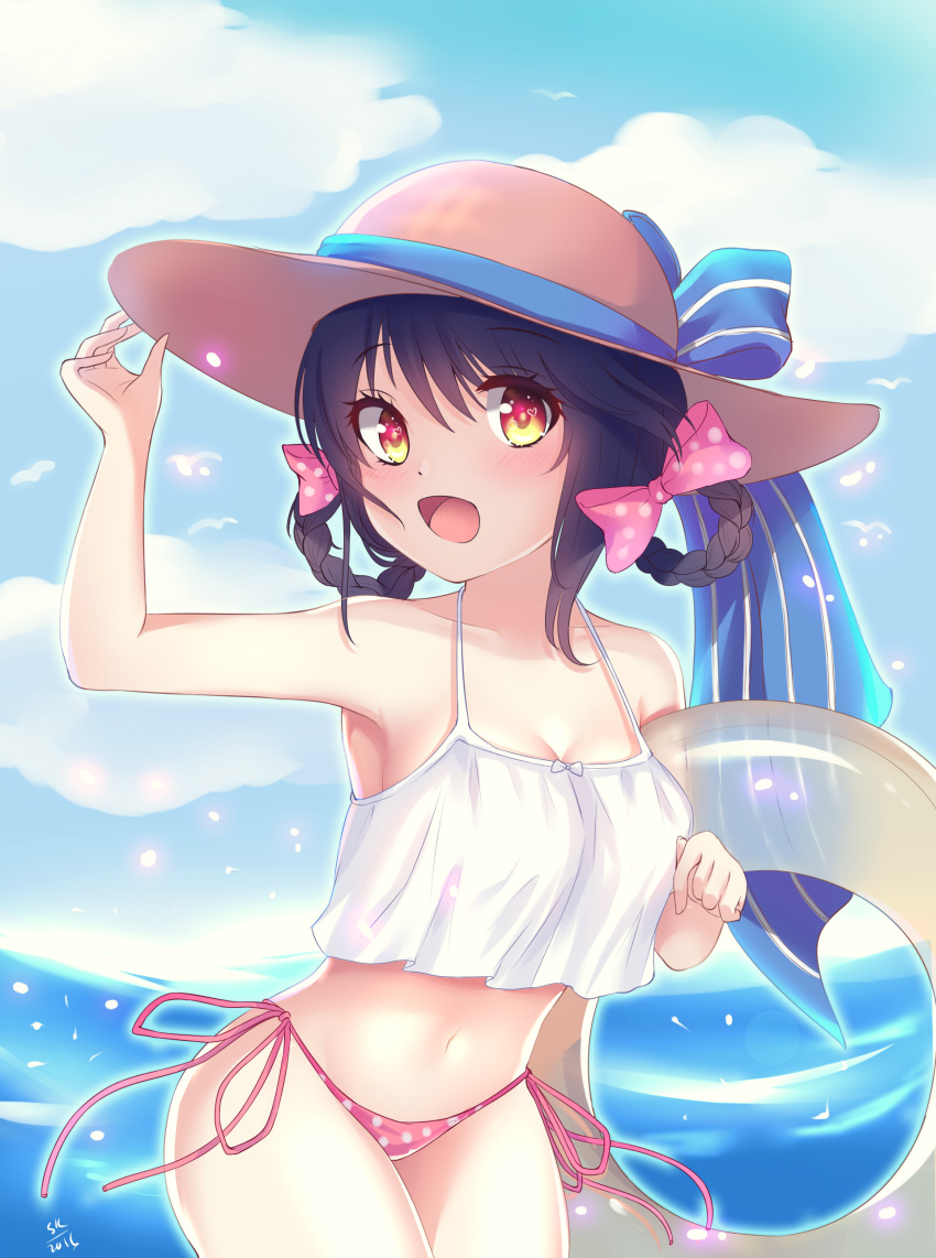 1girl 2016 absurdres bare_shoulders bikini black_hair blue_ribbon blue_sky blush bow breasts brown_hat cleavage clouds cloudy_sky collarbone cowboy_shot crop_top crop_top_overhang dated day eyebrows_visible_through_hair eyelashes hair_bow hair_ornament hair_ribbon hand_on_headwear hand_up hat hat_ribbon heart heart-shaped_pupils highres holding innertube legs_together looking_at_viewer medium_breasts midriff navel ocean open_mouth orange_eyes original outdoors polka_dot polka_dot_bikini polka_dot_bow ribbon short_hair side-tie_bikini side_braids sky sleeveless solo strap_gap sun_hat swimsuit symbol-shaped_pupils tamask water