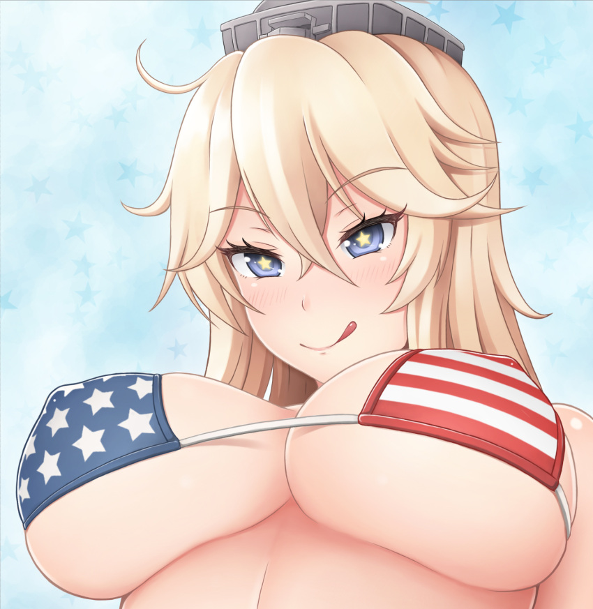 1girl :q ahoge american_flag_bikini bikini blonde_hair blue_background blue_eyes breasts clouds erect_nipples eyebrows_visible_through_hair flag_print from_below hair_between_eyes hat highres iowa_(kantai_collection) kantai_collection large_breasts licking_lips long_hair looking_at_viewer naughty_face ogoro sky solo star star-shaped_pupils swimsuit symbol-shaped_pupils tongue tongue_out tsurime under_boob