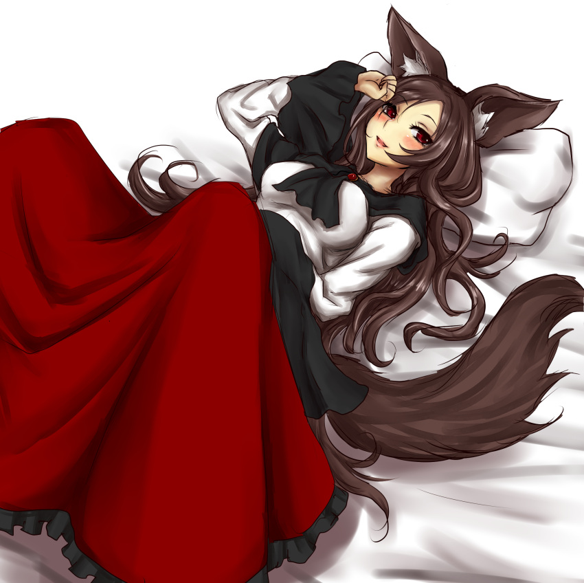 1girl adapted_costume amagi_(amagi626) animal_ears blush breasts brooch brown_hair frilled_skirt frilled_sleeves frills hand_to_forehead highres imaizumi_kagerou jewelry long_hair long_skirt lying medium_breasts on_back open_mouth pillow pink_lips red_eyes red_skirt shirt skirt smile solo tail touhou very_long_hair wavy_hair white_shirt wolf_ears wolf_tail