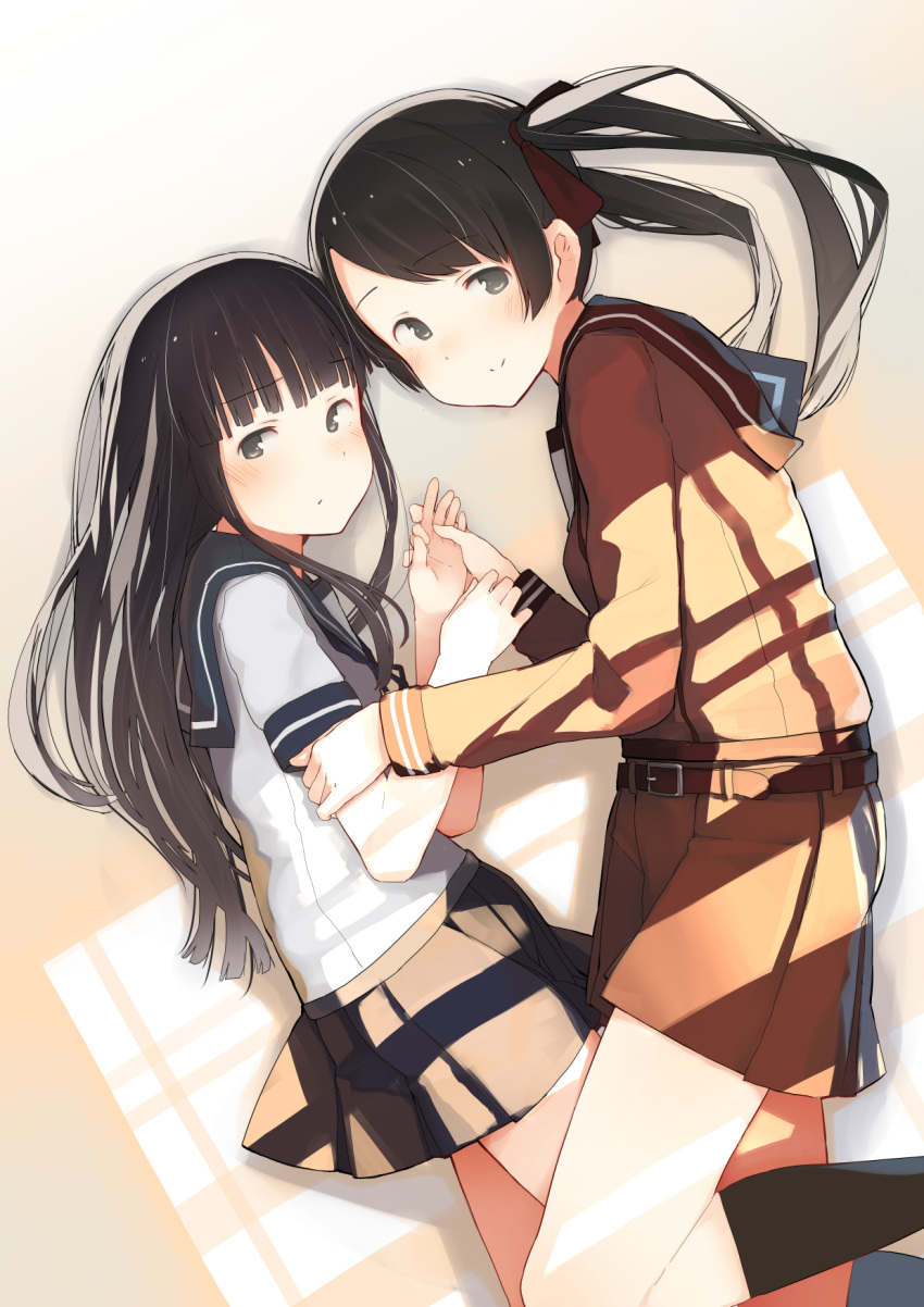 2girls arm_holding bangs belt belt_buckle black_eyes black_hair black_legwear blue_skirt blunt_bangs blush brown_hair buckle closed_mouth cowboy_shot eyebrows eyebrows_visible_through_hair from_side fuu_fuu hair_ribbon hand_holding hand_on_another's_arm hatsuyuki_(kantai_collection) highres kantai_collection kneehighs long_hair long_sleeves looking_at_viewer lying mikuma_(kantai_collection) multiple_girls on_side pleated_skirt red_ribbon red_skirt ribbon school_uniform serafuku shadow short_sleeves sidelocks skirt smile twintails