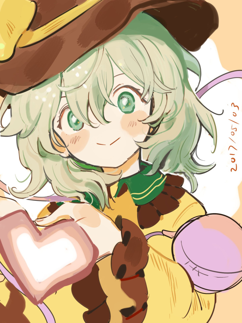 1girl 2017 :&gt; black_hat blush blush_stickers buttons closed_mouth collared_shirt dated eyeball eyelashes fingernails frilled_shirt_collar frilled_sleeves frills green_eyes green_hair hair_between_eyes hands_up hat hat_ribbon heart highres holding holding_heart komeiji_koishi long_sleeves looking_at_viewer nengo no_nose ribbon shirt short_hair smile solo tareme third_eye touhou upper_body wavy_hair white_background wide_sleeves yellow_ribbon yellow_shirt