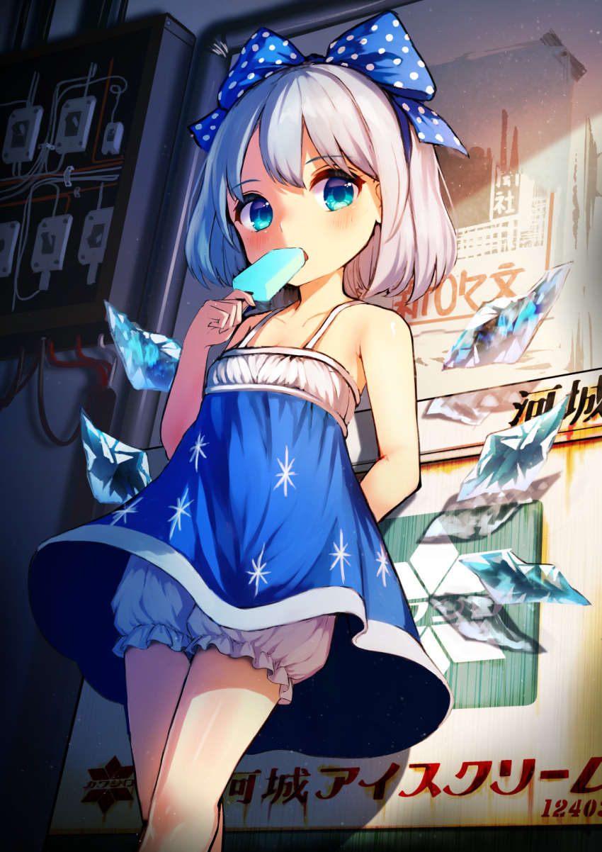 1girl arm_behind_back bare_arms bloomers blue_bow blue_dress blue_eyes blue_hair bow cable cirno dress eating eyebrows_visible_through_hair food hair_bow highres holding ice ice_wings looking_at_viewer polka_dot popsicle poster_(object) pyonsuke_(pyon2_mfg) short_hair solo standing touhou underwear wings